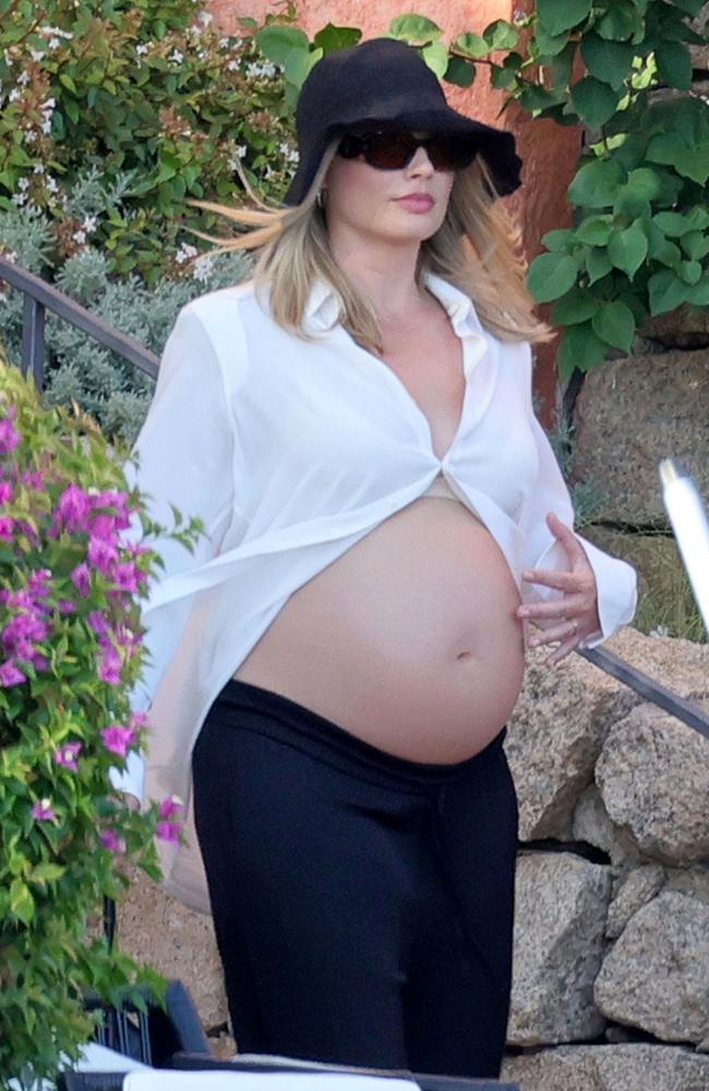 Margot Robbie Proudly Displays Baby Bump During Sardinia Holiday