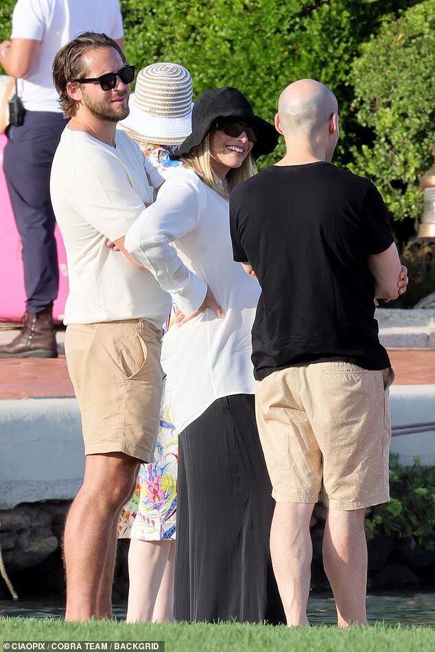 Margot Robbie Shows Off Baby Bump in Sardinia During Babymoon with Tom Ackerley