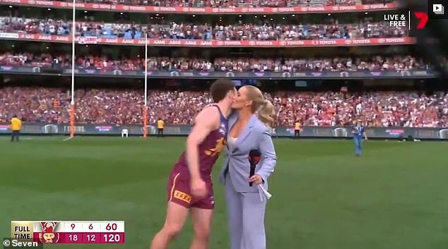 "Abbey Holmes and Lachie Neale Celebrate AFL Grand Final Win with Defiant Kiss Amid Controversy"