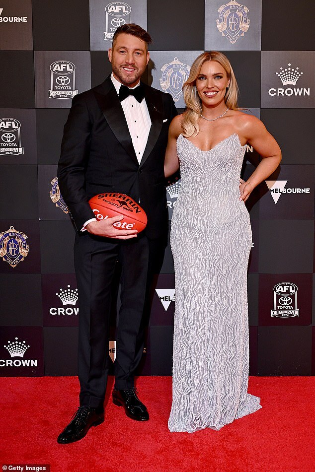 "Abbey Holmes Dazzles in Silver Gown at 2024 Brownlow Medal Red Carpet in Melbourne"