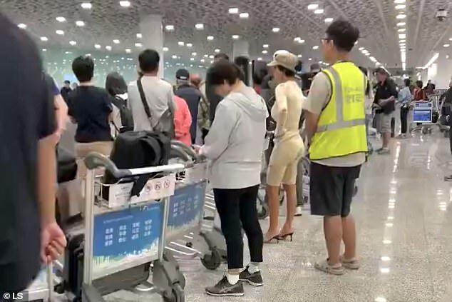 Bianca Censori Sports Cream Top and Cycling Shorts at Tokyo Airport with Kanye West