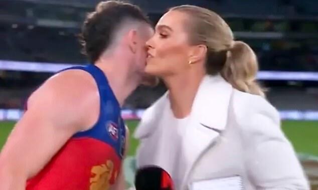 "Abbey Holmes and Lachie Neale Celebrate AFL Grand Final Win with Defiant Kiss Amid Controversy"