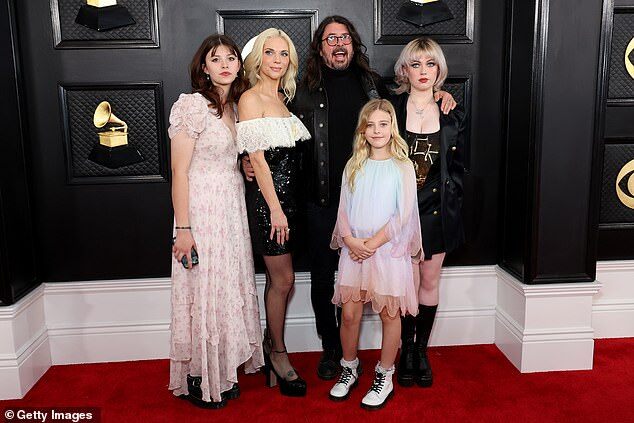 Dave Grohl's Family Man Image Crumbles Amid Secret Love Child Revelations and Divorce Speculations