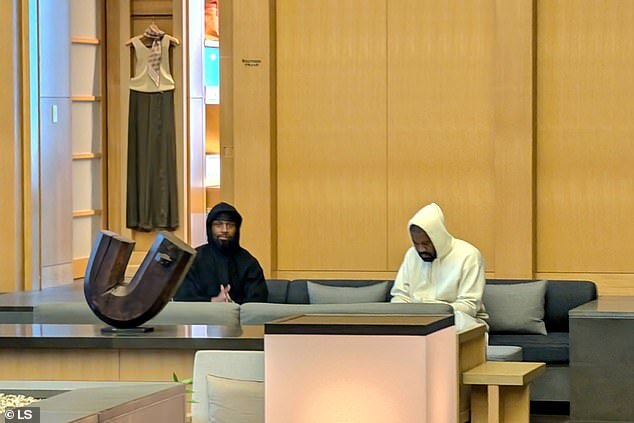 Bianca Censori Sports Cream Top and Cycling Shorts at Tokyo Airport with Kanye West