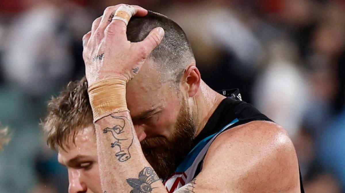 Charlie Dixon Retires from AFL After Overcoming Challenges and Celebrating Memorable Career