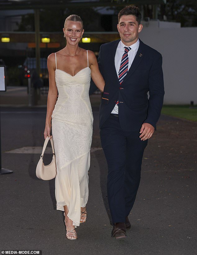 Glamorous Night for Sydney Roosters: Players Shine in Navy Suits, Wives Dazzle in Stunning Gowns