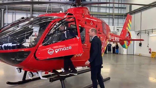 Prince William and David Beckham Examine New Air Ambulance Helicopters at RAF Northolt