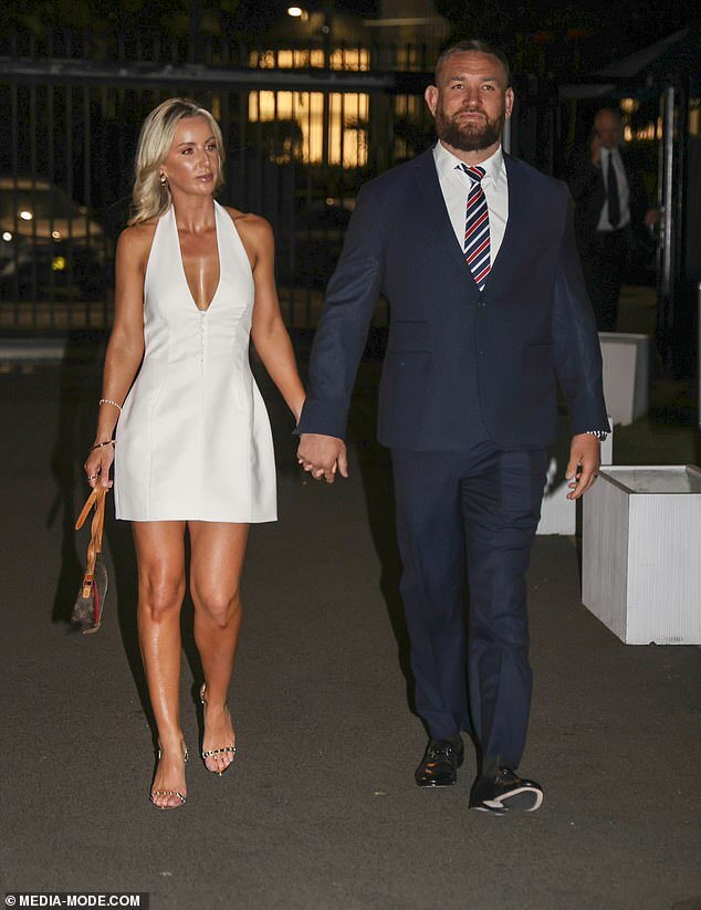 Glamorous Night for Sydney Roosters: Players Shine in Navy Suits, Wives Dazzle in Stunning Gowns