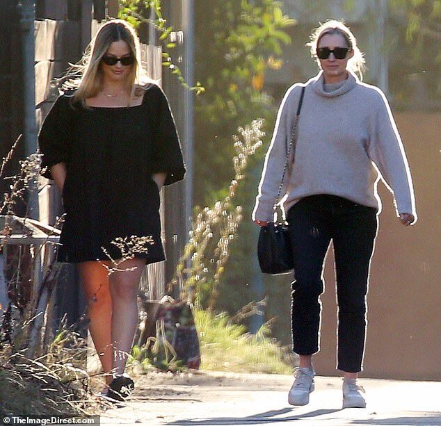 Margot Robbie Stuns in Black Mini Dress During LA Walk One Month Post-Baby Arrival