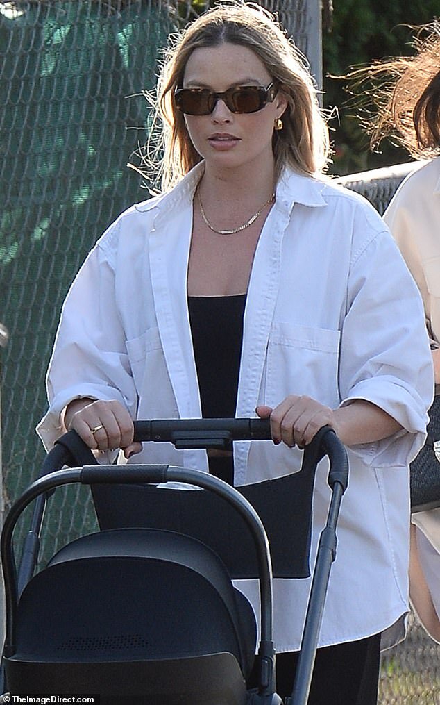 Margot Robbie Shines During Stroll in Los Angeles with Newborn Son