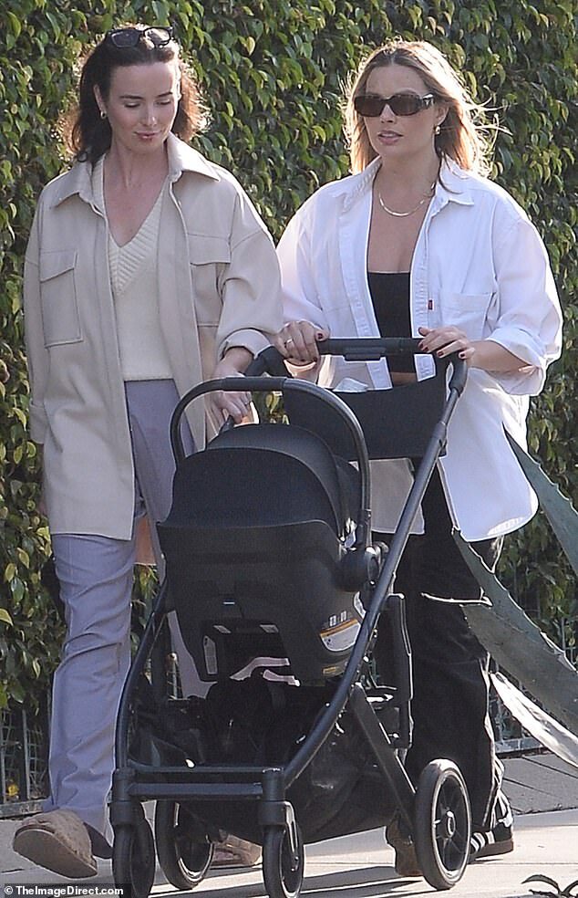 Margot Robbie Shines During Stroll in Los Angeles with Newborn Son