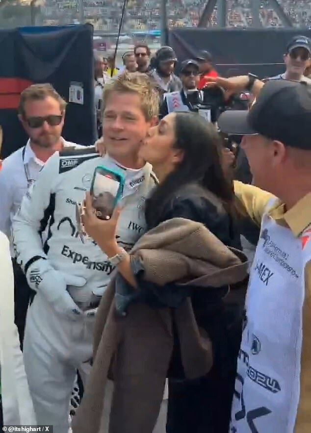 Brad Pitt Reacts to Unexpected Neck Grab and Kiss from Fan at Mexican Grand Prix Event