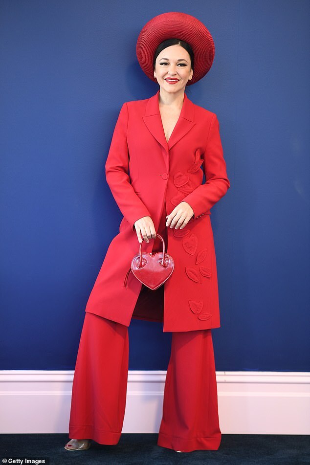 Melbourne Cup 2024: Bold Red Dominates Fashion Trends Amidst Daring Styles and Headwear