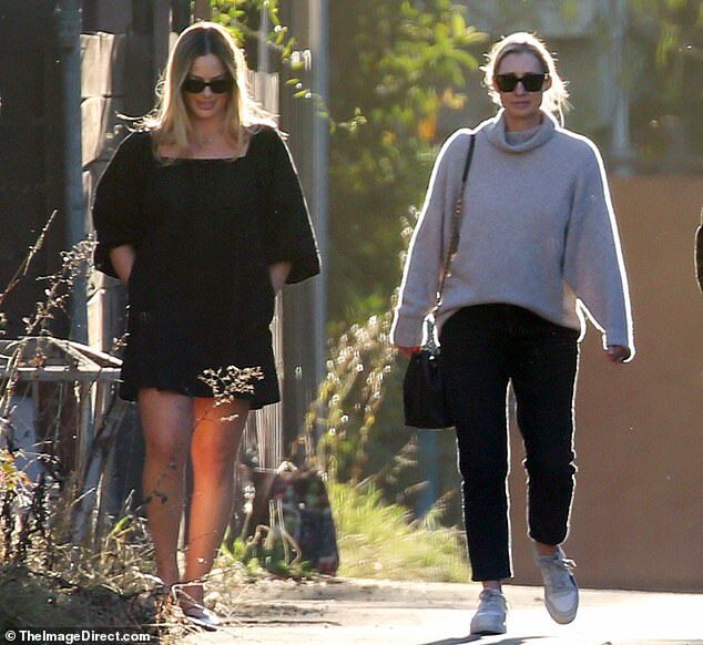 Margot Robbie Stuns in Black Mini Dress During LA Walk One Month Post-Baby Arrival