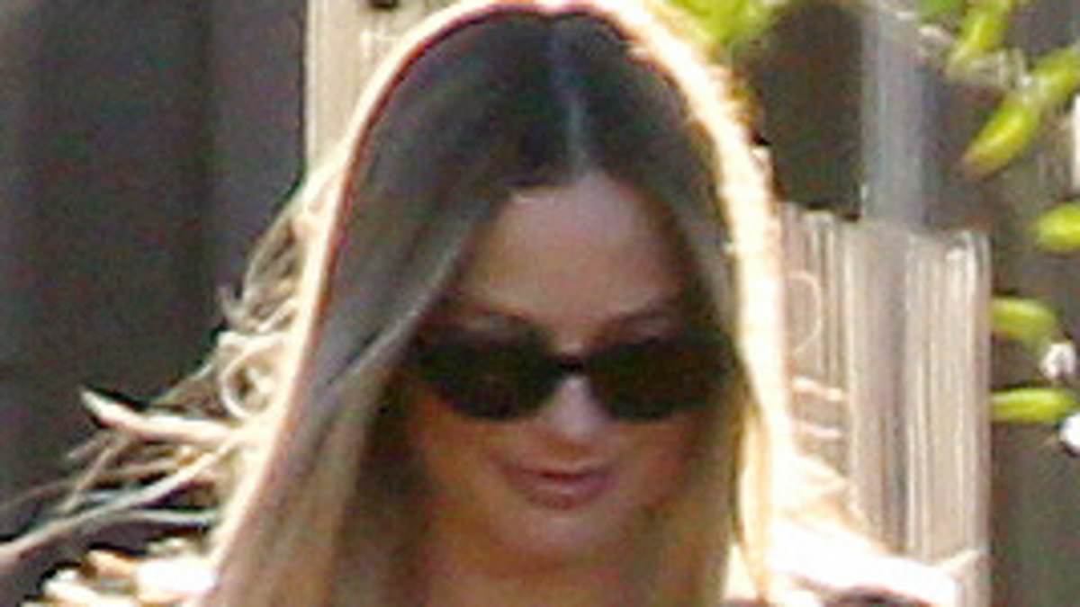 Margot Robbie Stuns in Black Mini Dress During LA Walk One Month Post-Baby Arrival